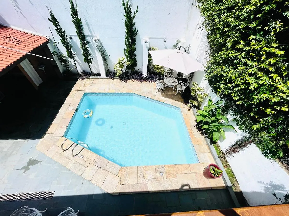 A Casa Que Hospeda Apartamento São Paulo Quarto em Acomodações Particulares